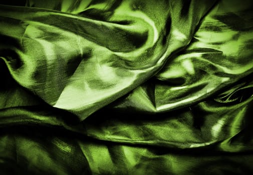texture of a dark green silk
