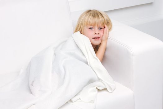 Fine little girl sleeping in bed at home