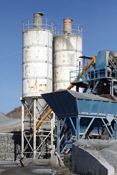 View of stone quarry with silos