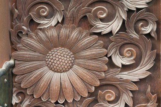  art wooden carvings of sunflower on the Temple's Gate Door, Higashi Honganji Temple in Kyoto, Japan