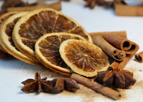 Tea, cinnamon sticks and dry orange
