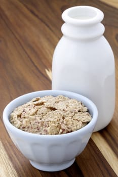 Delicious and healthy breakfast cereal with milk and orange juice