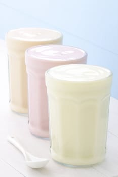 Fresh, healthy and delicious creamy yogurt in vintage French jar, the perfect snack or dessert.