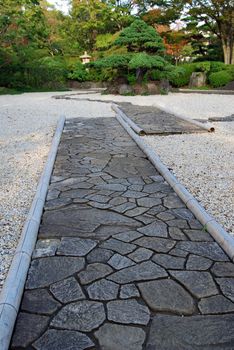 stone way and evergreen tree in japanese stone garden, Tokyo Japan