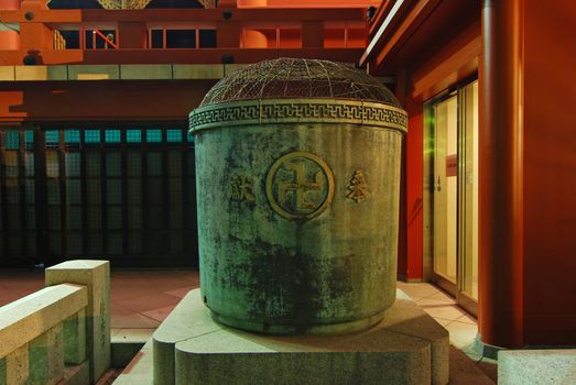 sacred Buddhist ash-urn at the yard of Asakusa Temple, Tokyo Japan