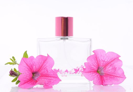 women's perfume in beautiful bottle and flower