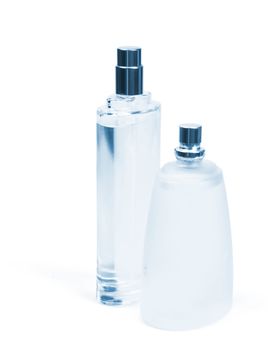 glass bottles of perfume on a white background