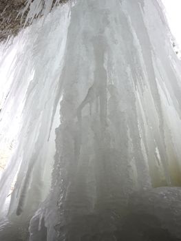 icicles above the frozen river