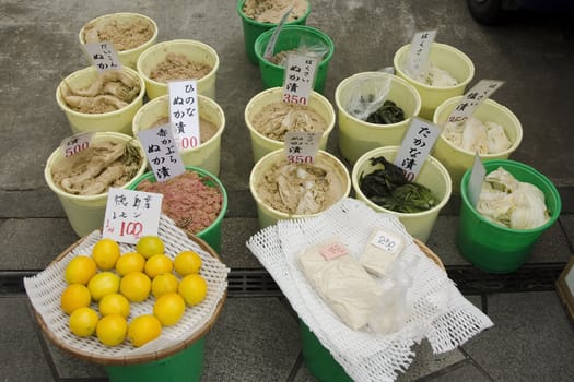 Pickled vegetables on a marked in Japan with white raddish 