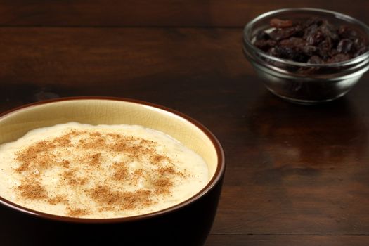 delicious rice pudding  with  cinamon and raisins one of the most delicious desserts ever 