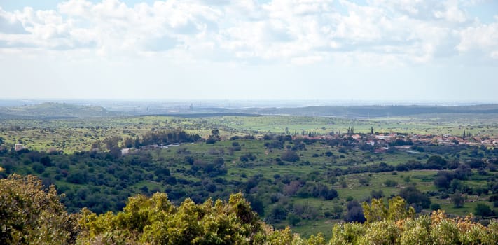 Outdoor panorama of green fields and hills at spring in Israel.