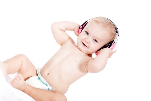 cute little baby with protection earphones isolated on white
