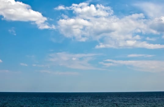 Beautiful sea and clouds sky .