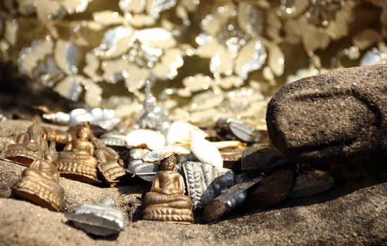 Close up small buddha statue in hand image, Ayutthaya, Thailand