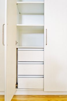 Built-in cabinet in room of an unoccupied newly-built apartment.