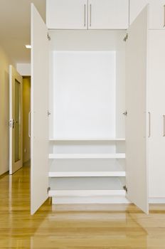 Built-in cabinet in room of an unoccupied newly-built apartment.