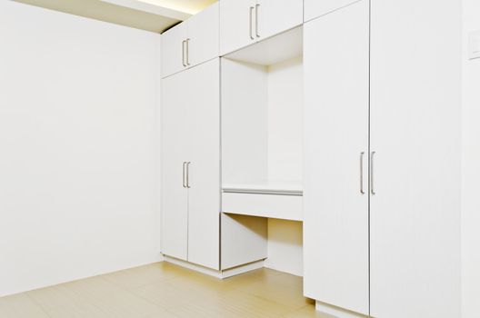 Newly built room cabinets in a white room