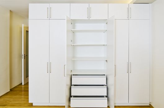 White and newly built and painted room cabinets