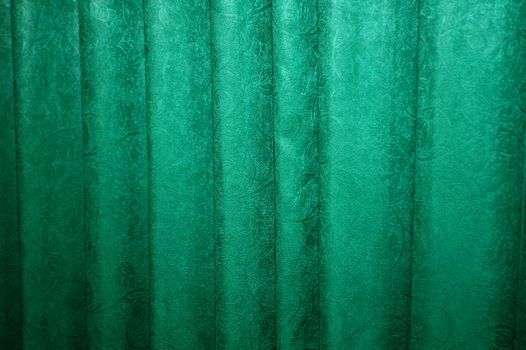 flower motif on a green curtain