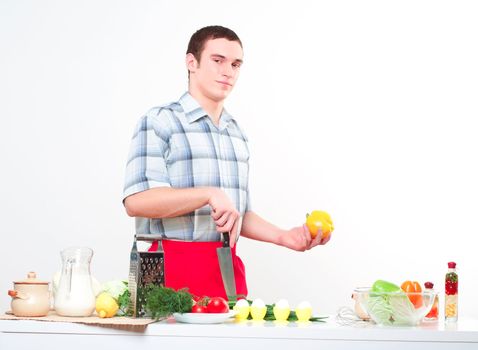 portrait of a man, cut vegetables, make meal