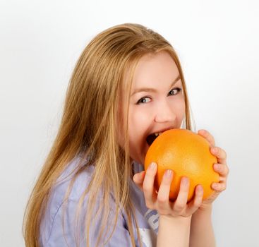 Portrait of Attractive Woman with Grapefruit closeup on white background