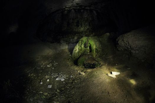 Mountain spring in the rock at night. Cave city Eski-Kermen, Crimea, Ukraine 
