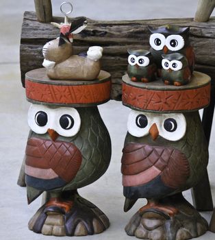 wooden owl in brown color