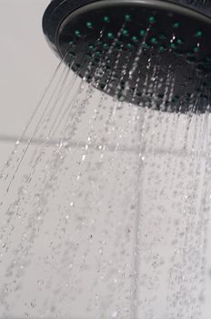 water drops falling from a shower indoors