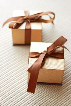 Two luxury gift boxes with ribbon and bow