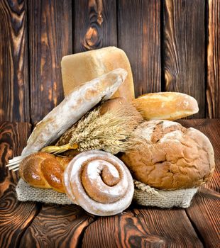 Bakery products on a wooden brown background