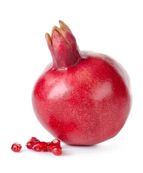 Pomegranate and seeds isolated on a white background
