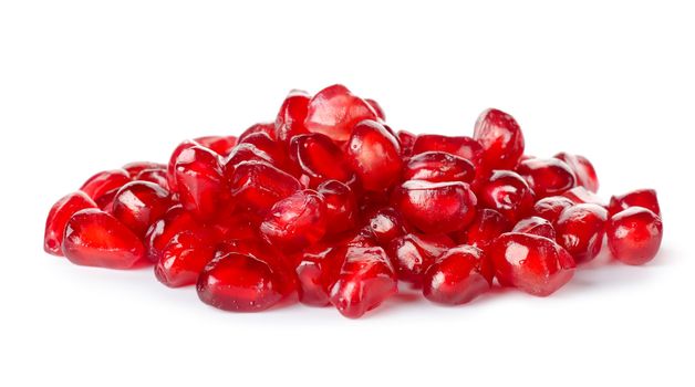 Pomegranate seeds isolated on a white background