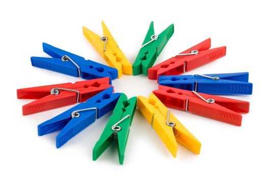 Photo of Colour clothes-peg on the white background 