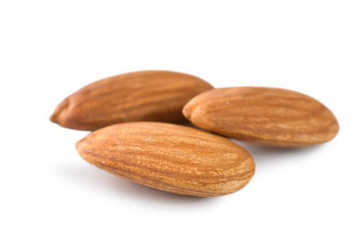 Three almond isolated on a white background