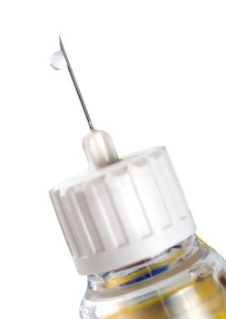 Insulin pen injection with drop of insulin hormone on needle