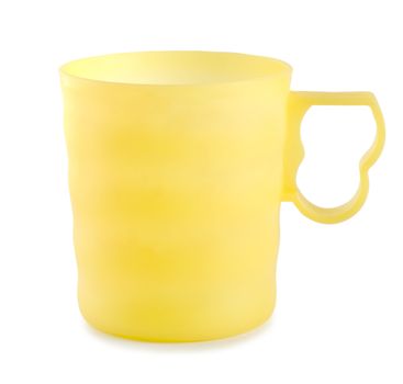 Yellow mug isolated on a white background