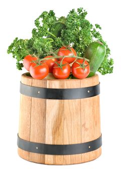 Wooden barrel with vegetables isolated on a white background