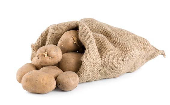 Raw potatoes in a hessian sack isolated on a white background