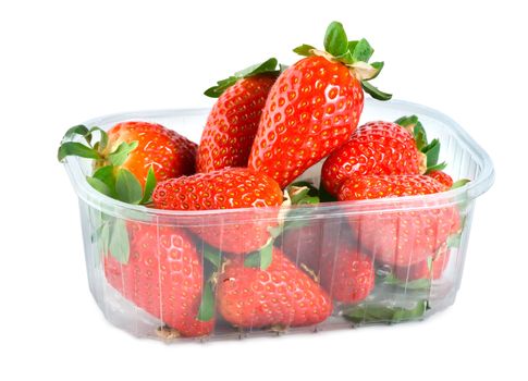 Strawberries in plastic container isolated on a white background