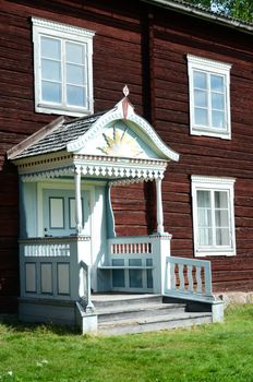 Entrance facade of an old farm in northern Sweden, called "brokvist"