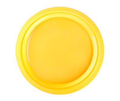 Yellow disposable plate isolated on white background