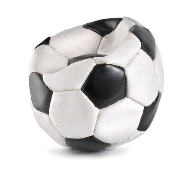Deflated soccer ball isolated on white background. 