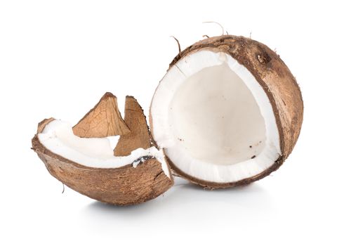 Two parts of a coconut isolated on white background