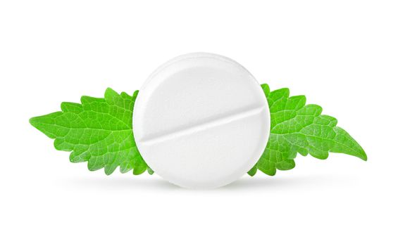 Aspirin with mint leaves isolated on white background