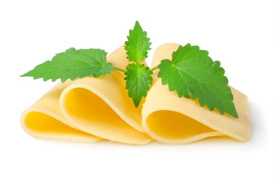 Cheese and mint leaves isolated on white background