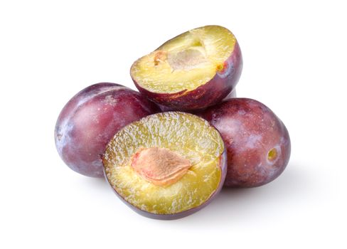 Three plums isolated on a white background