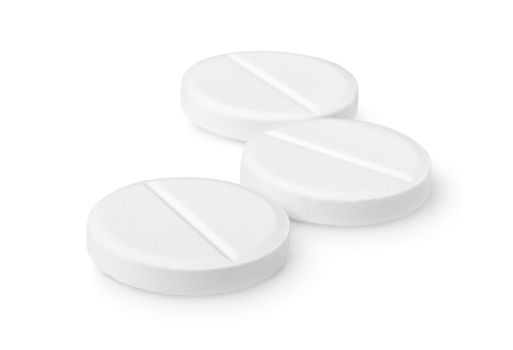 Three tablets aspirin isolated on a white background