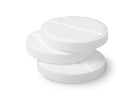 Three tablets aspirin isolated on a white background