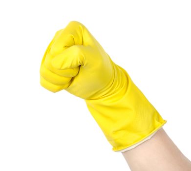 The fist in a yellow glove is isolated on a white background