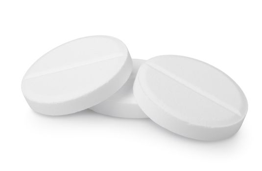Three tablets aspirin isolated on a white background